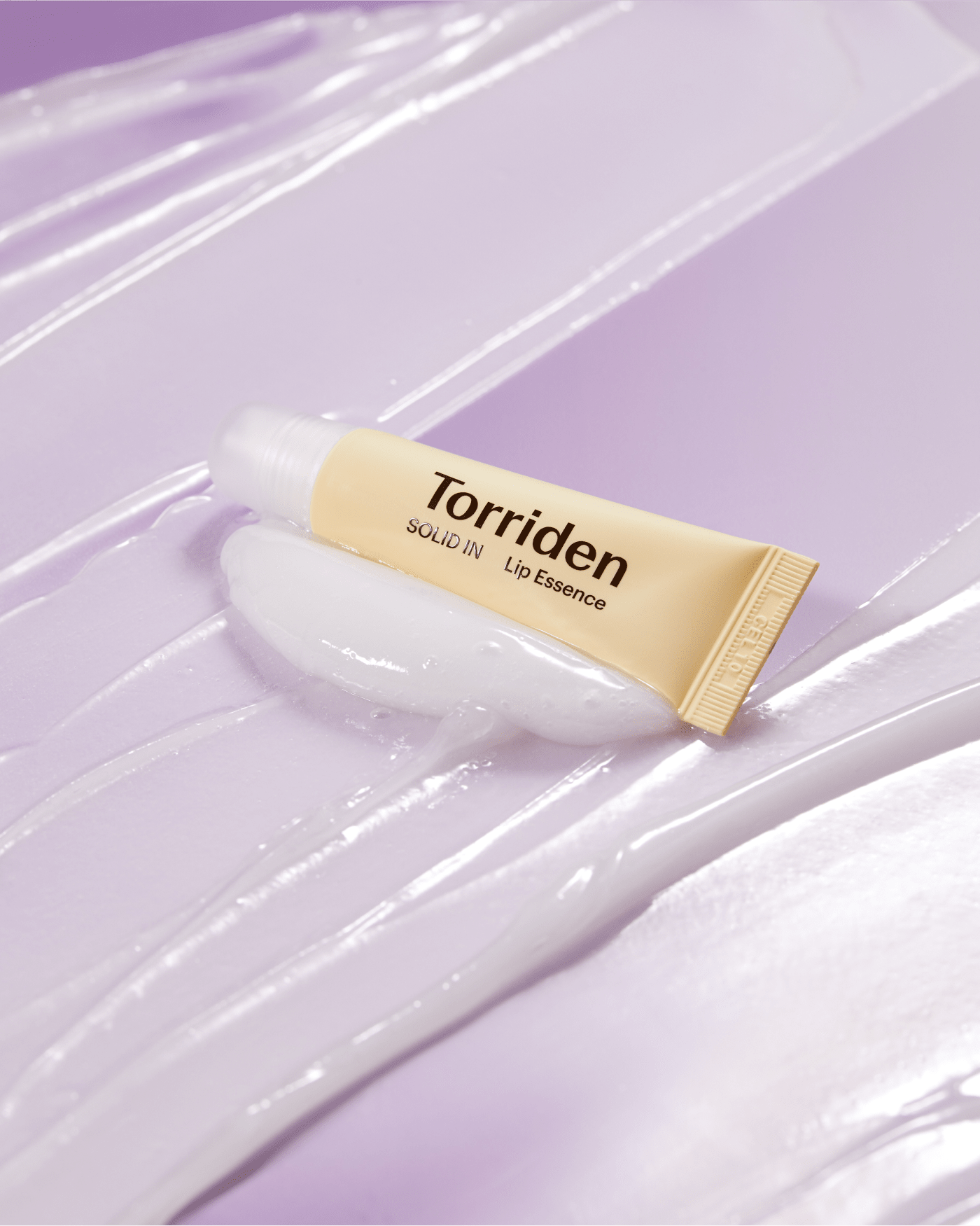 Torriden SOLID IN Ceramide Lip Essence, a ceramide lip treatment that softens and hydrates dry lips.